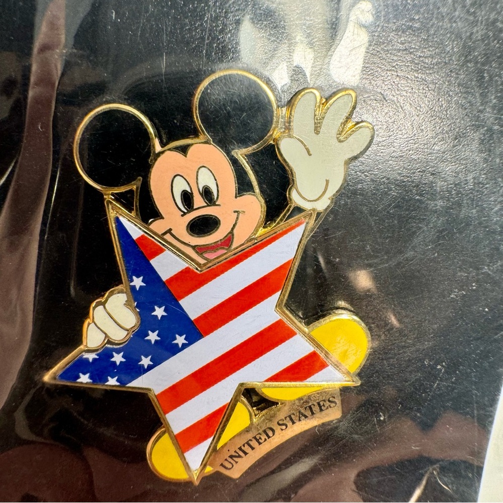 Vintage Disney pin. 100 Years of Dreams United States Flag with Mickey Mouse